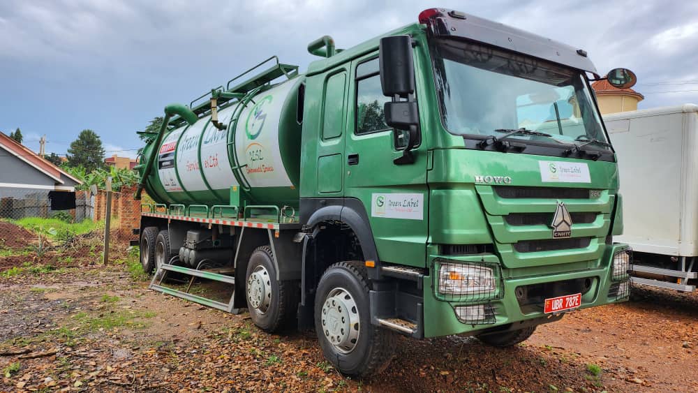 Waste collection truck on road